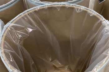 Liner in plastic drum for shipping chemicals