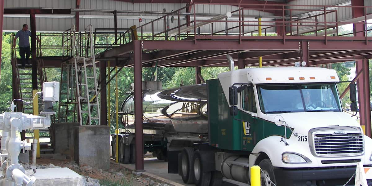 Truck transporting chemicals parked at toll blender facility