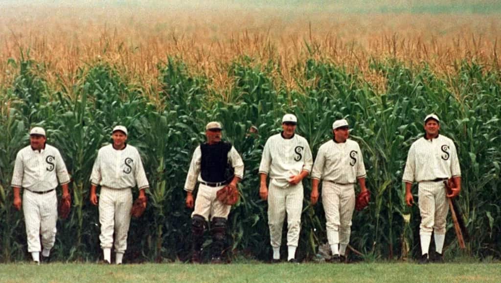 baseball team coming out from cornfield